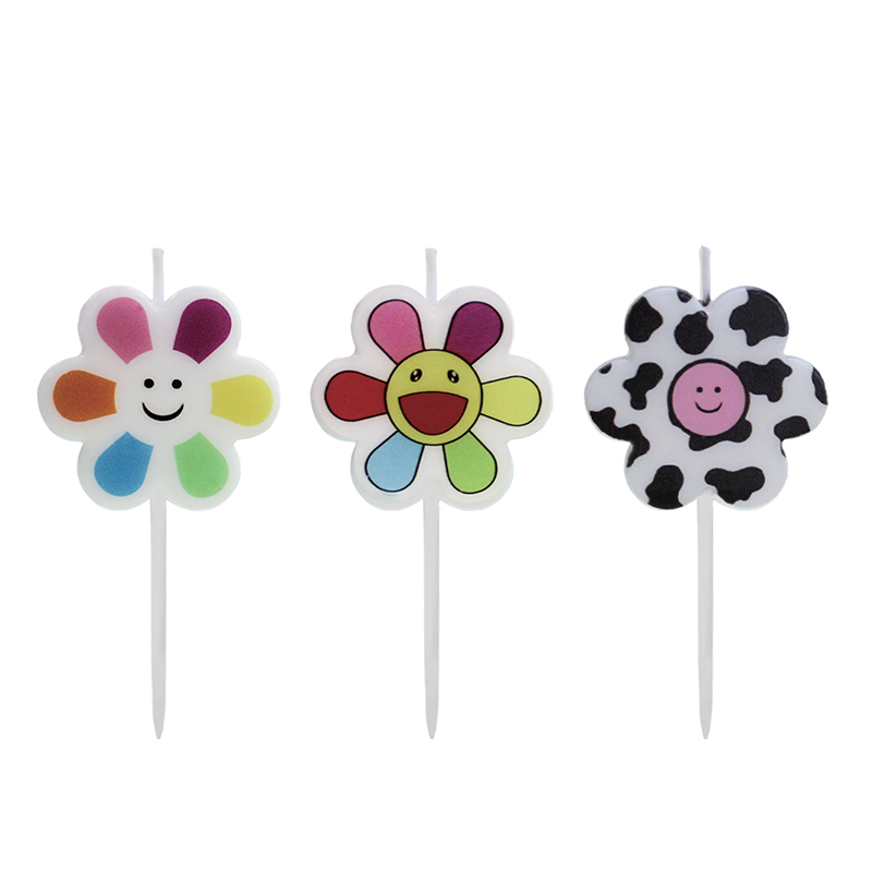Vela estampada em cor de rosto sorridente de flor